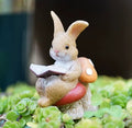 Reading Rabbit Fairy Garden Figurine – Mini Bunny on Mushroom Plant Decor – Succulent Planter Decoration – Miniature Garden Accessory Gift